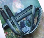 We have adopted the braiding technique known as Bamboo-gumi, which dates back to the Kamakura period and was primarily used for horse bridles (omogai). Its characteristic is that a variety of patterns can be created through different combinations of the braided cords. It's a flat, soft camera strap. The ring conection part is sewing with the leather，it is best to match the color you prefer with the leather you are making the Kumihimo with.