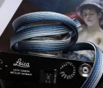 Bamboo Royal Blue is a handmade camera neck strap made with Japanese kumihimo silk and genuine leather. Comfortable, durable, and ideal for premium cameras.