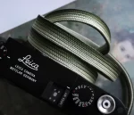 Bamboo Safari is a handmade camera neck strap made with Japanese kumihimo silk and genuine leather. Comfortable, durable, and ideal for premium cameras.