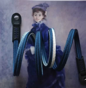 Crown Royal Blue is a handmade camera neck strap made with Japanese kumihimo silk and genuine leather. Comfortable, durable, and ideal for premium cameras.