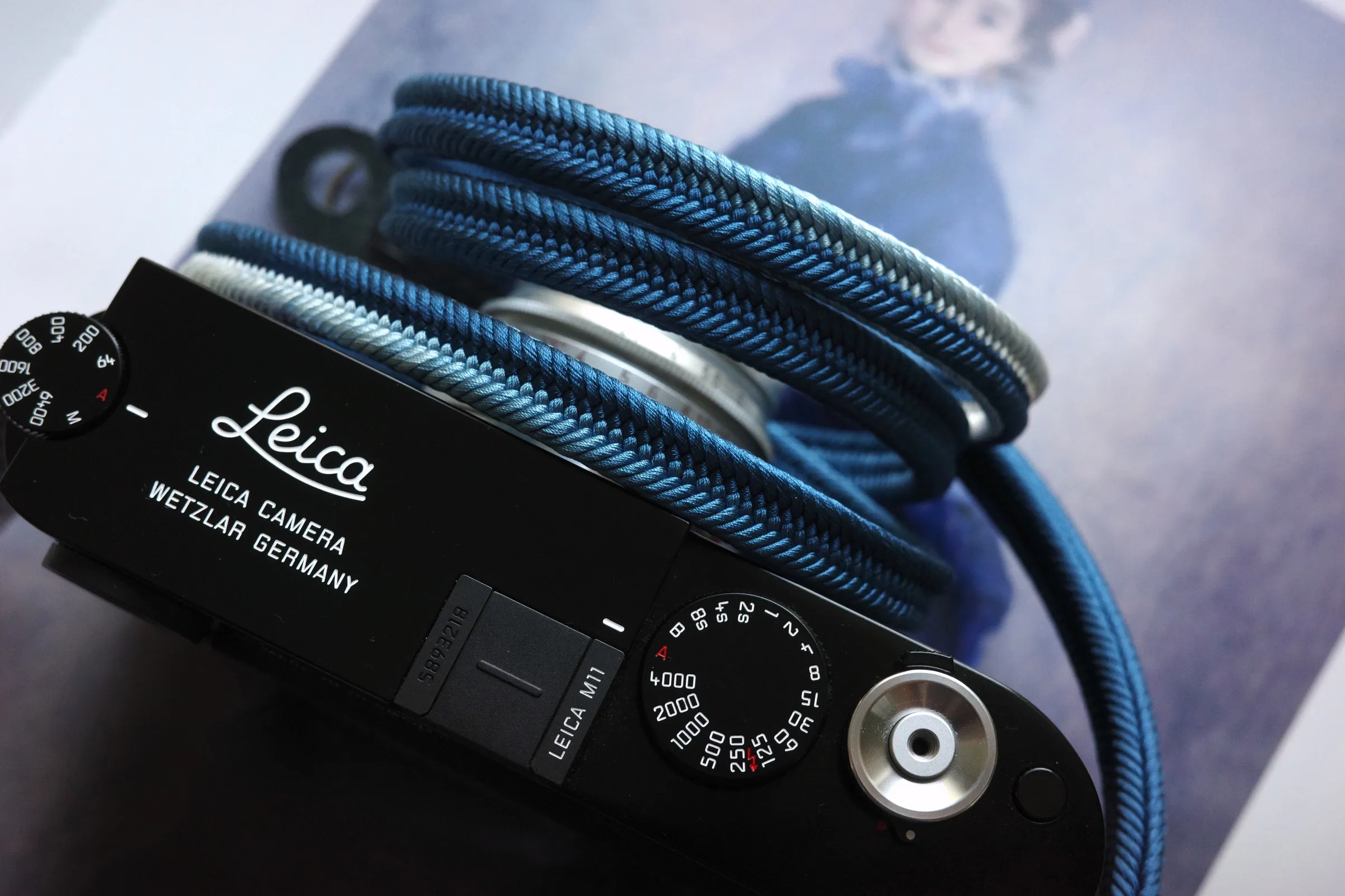 Crown Royal Blue is a handmade camera neck strap made with Japanese kumihimo silk and genuine leather. Comfortable, durable, and ideal for premium cameras.